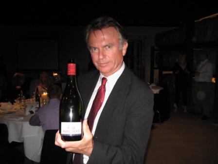 Sam Neill with Two Paddocks Pinot Noir